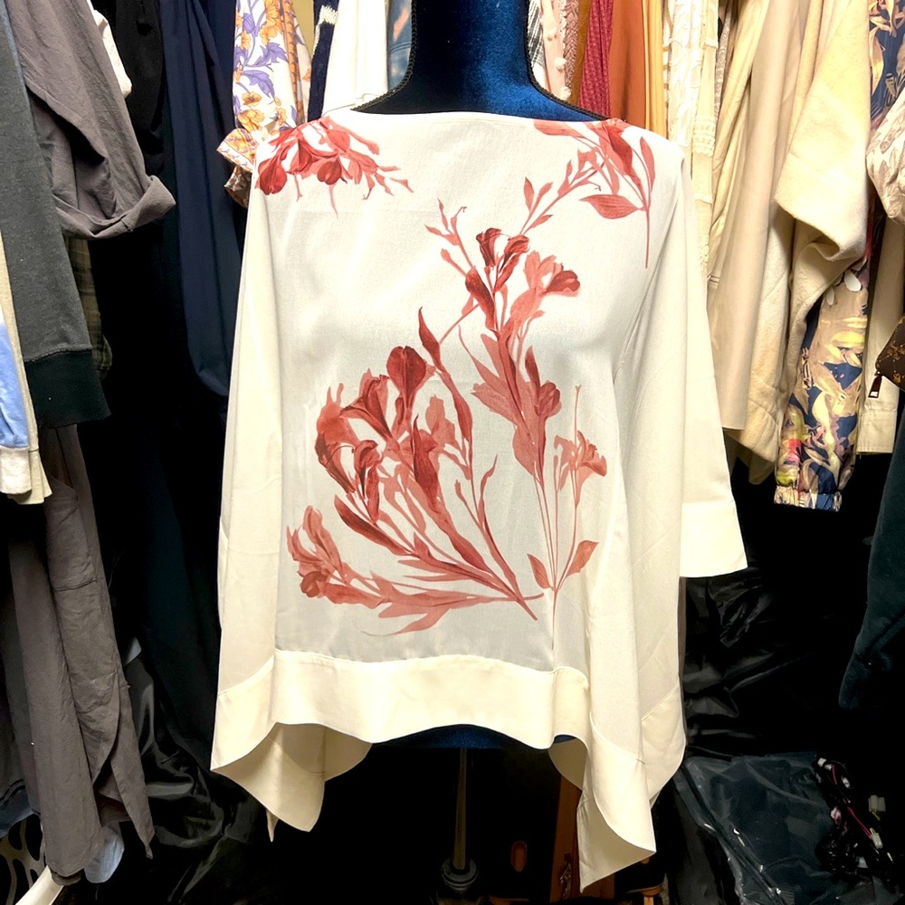 Woman’s cream sheer shawl with burgundy flowers on front